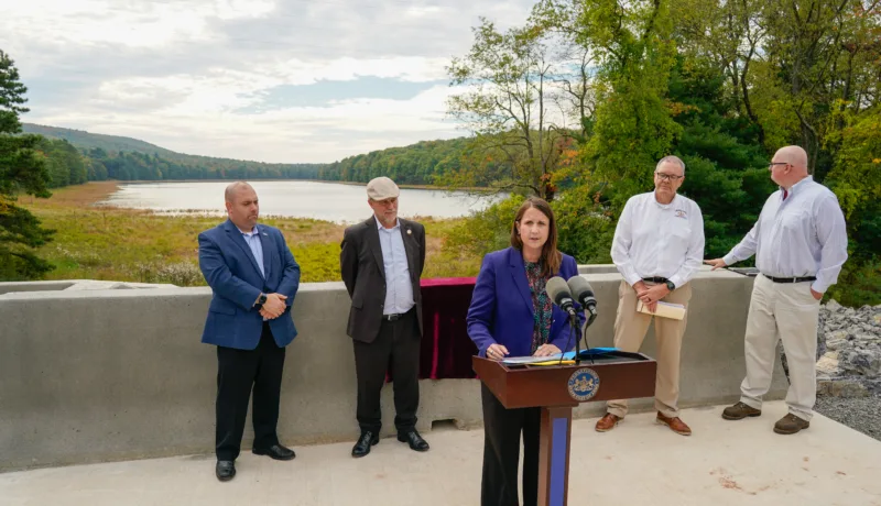 Officials celebrate rehabilitated dam